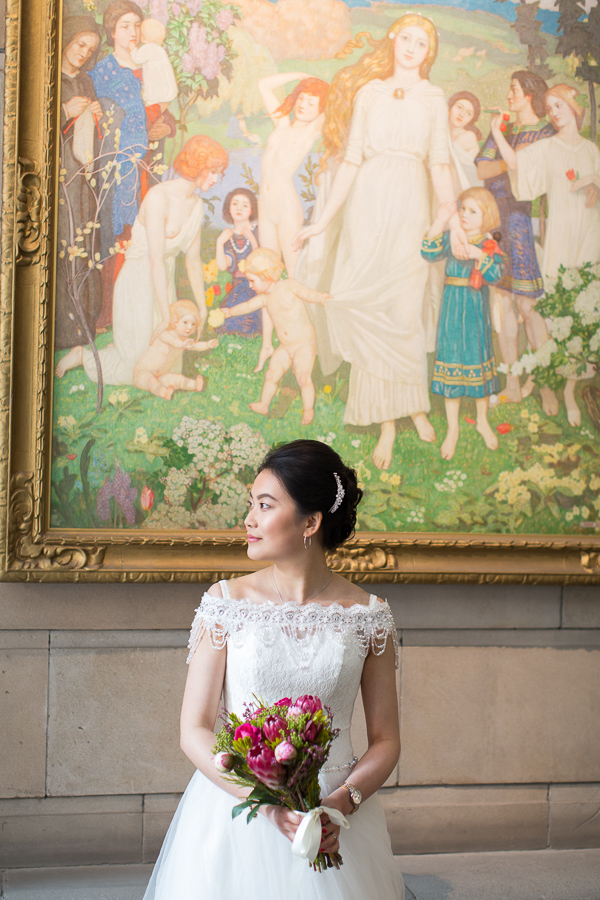 bride with flowers during photo shoot