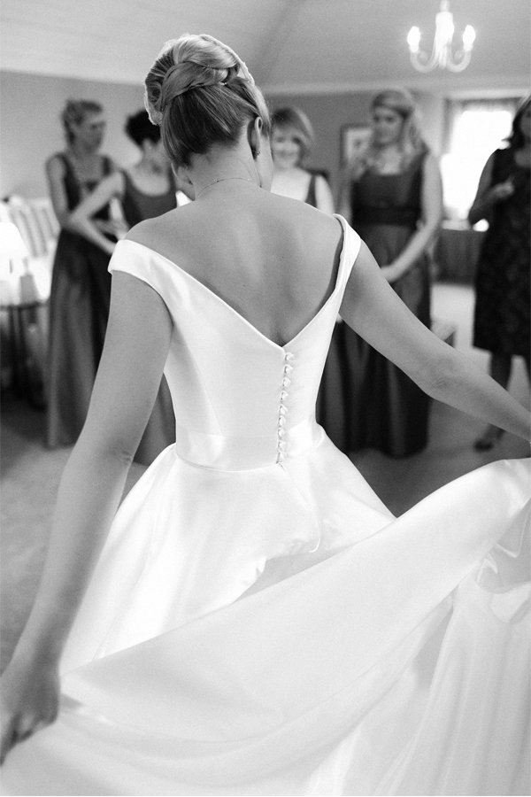 bride spreading her dress