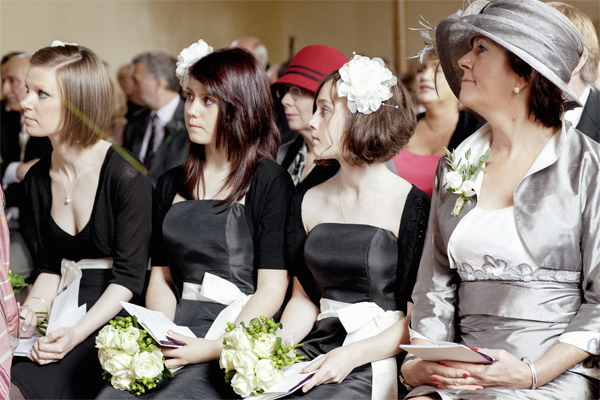 bridesmates and mother at church during wedding