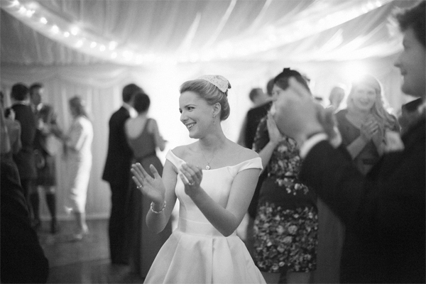 bride clapping after first few dances