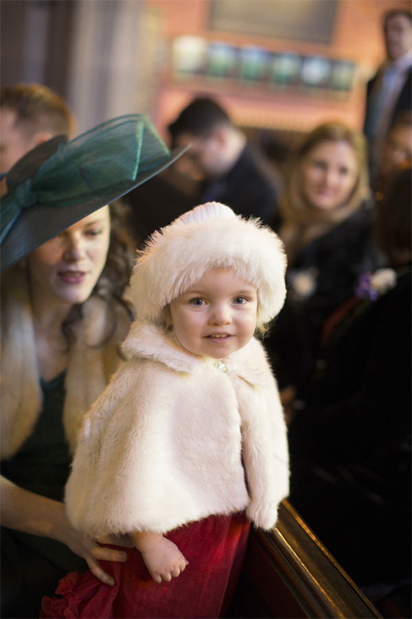 little girl in christmas outfit on a wedding in scotland 
