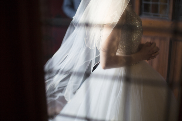 bride walking slowly into the church