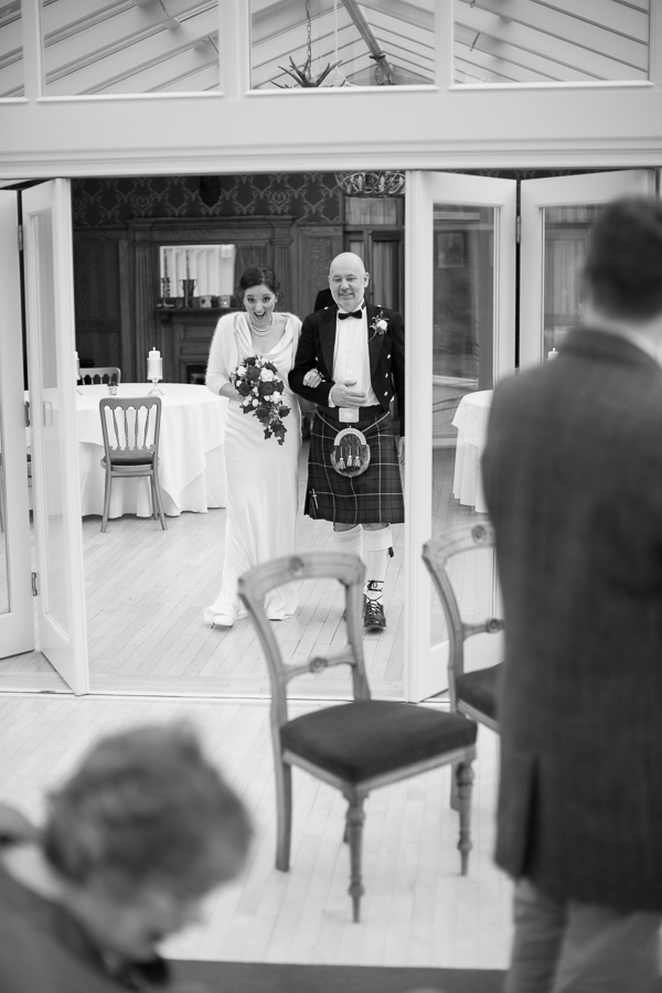 bride walking down the aisle at wedding 