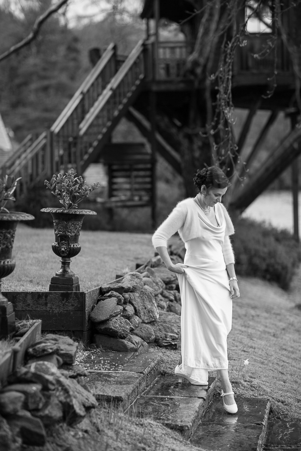 bride walking down stairs at the lodge on loch goil scotland