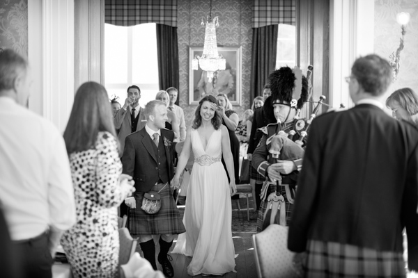 married couple piped in at Blairquhan Castle