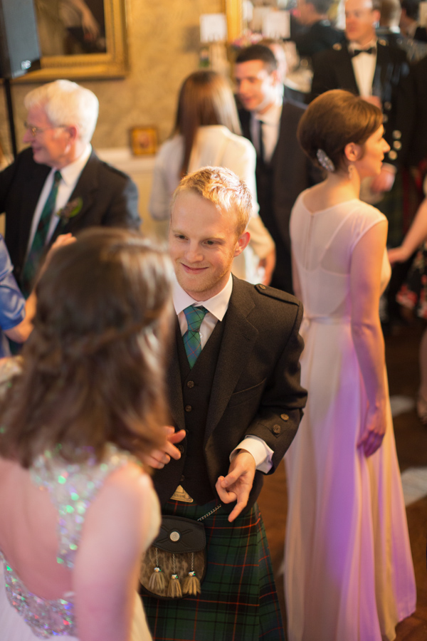 groom dancing with bride
