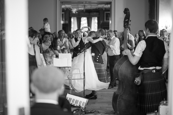 groom lifting bride during dancing at oxenford venue