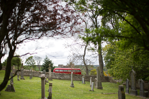 wedding bus parked next to church