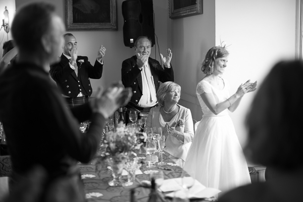 bridal party clapping during speeches