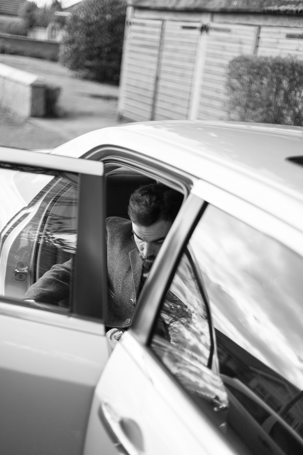groom getting into a car