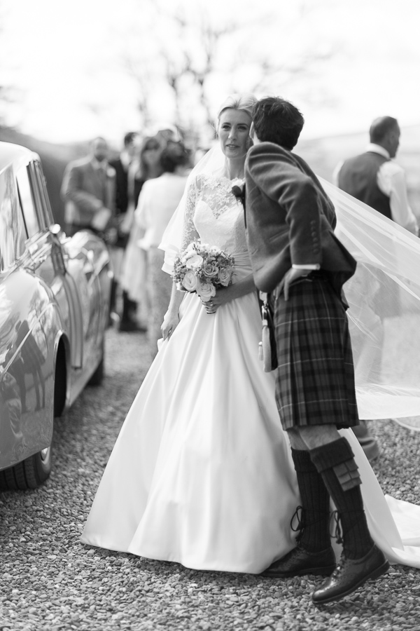 groom is kissing bride in a chick