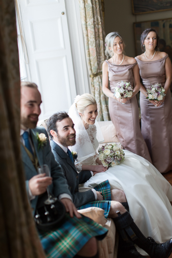 bridal party laughing at boturich castle wedding