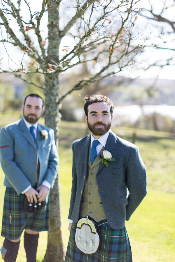 groom with his best man with loch lomond in the background