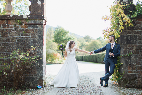 bride and groom holding hands wedding photos glasgow