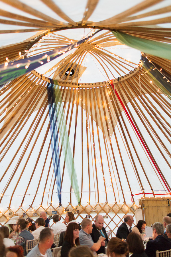 interior of tipi tent with wedding guests