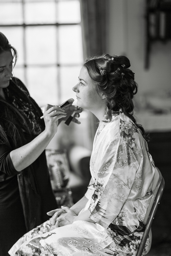 laura grey make-up artist with bride during preparations at ardkinglas