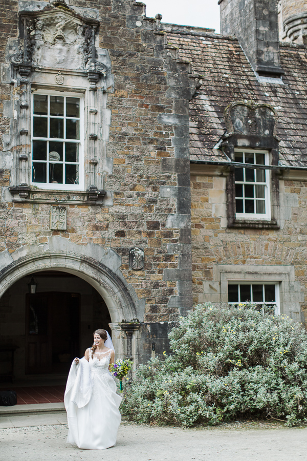 bride at the main entrance to ardkinglas 