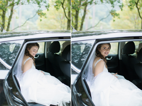 bride going out of car at outdoor ceremony