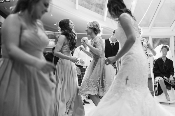 guests dancing in conservatory at the lodge on loch goil