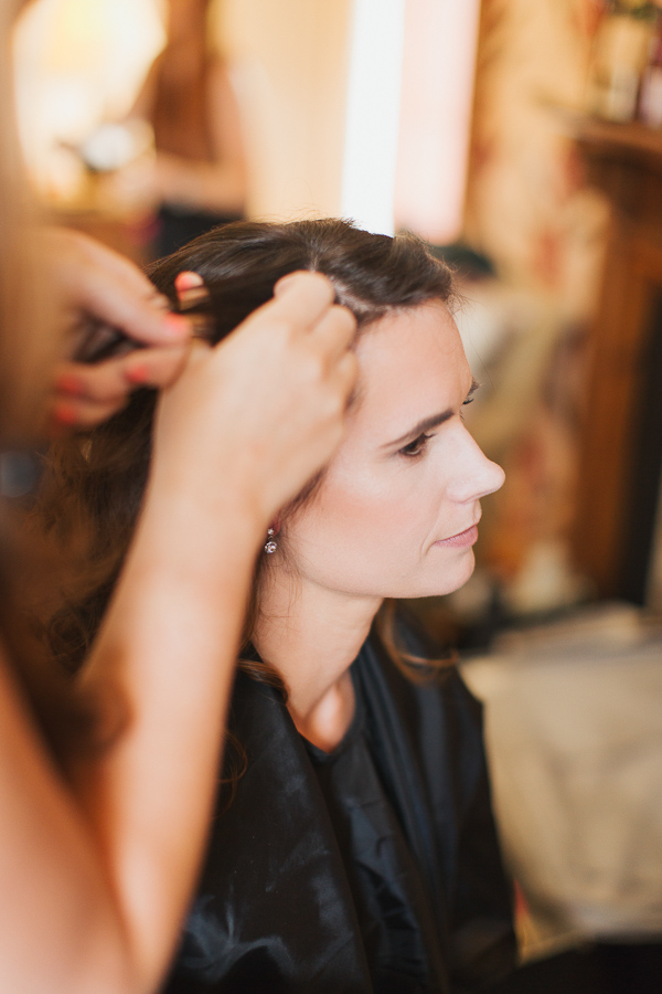 bride having her hair done during wedding at the lodge on loch goil