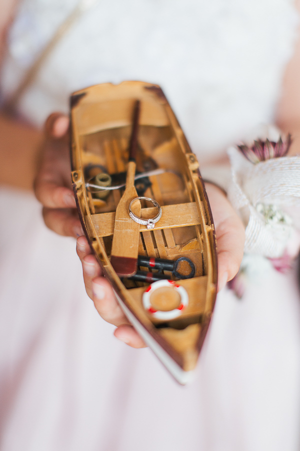 engagement ring on a mdel of a boat