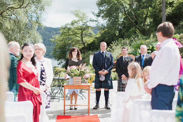 groom and guests waiting at wedding ceremony at the lodge on loch goil