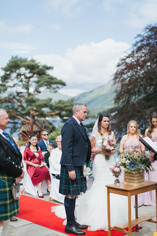 outdoors wedding ceremony at the lodge on loch goil