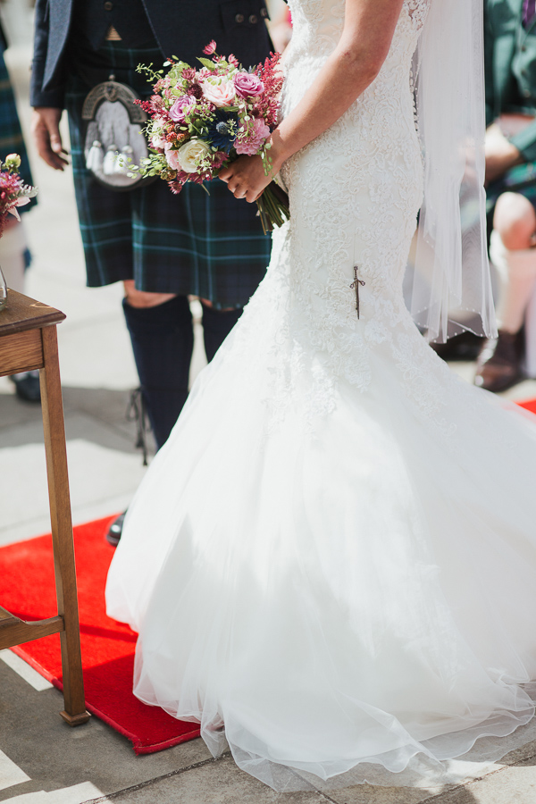 brides details during wedding ceremony