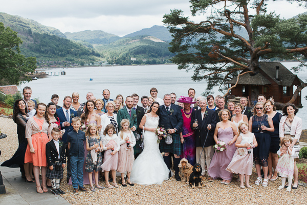group shot of family and friends at the lodge on loch goil