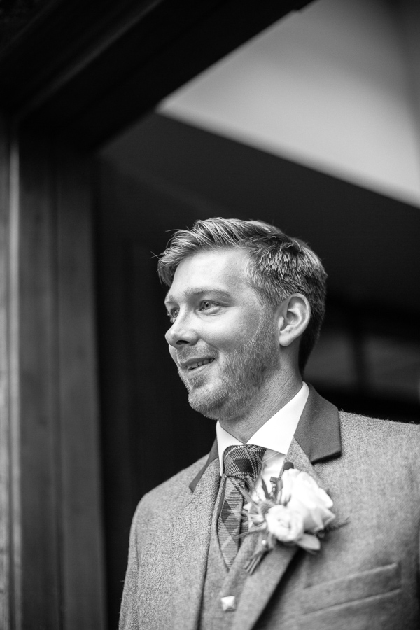 groom awaiting the bride  at the bearsden church scotland 