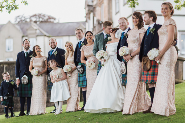 bride and groom kissing wedding photographer glasgow prices