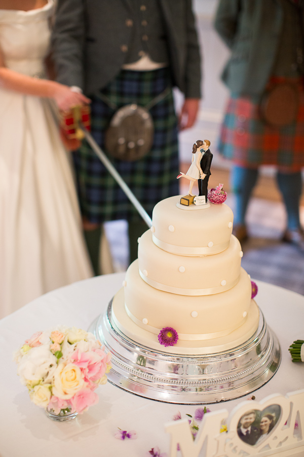 cutting of the cake with cool cake