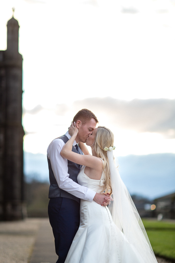 evening kiss of married couple mar hall scotland 