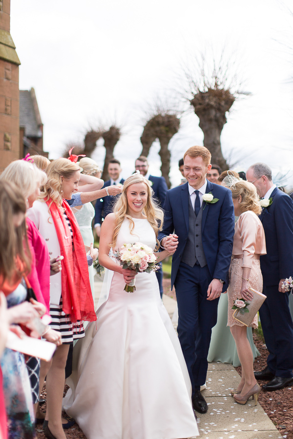 married couple walking after ceremony scotland 