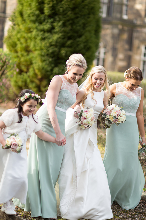 scottish bride walkign with her bridal party mar hall