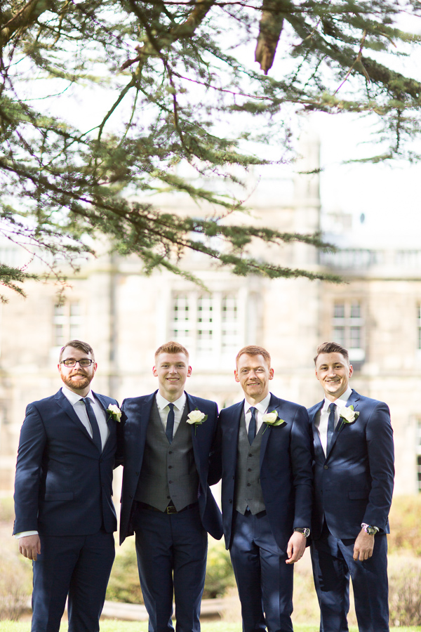 scottish groom with ushers in mar hall garden scotland