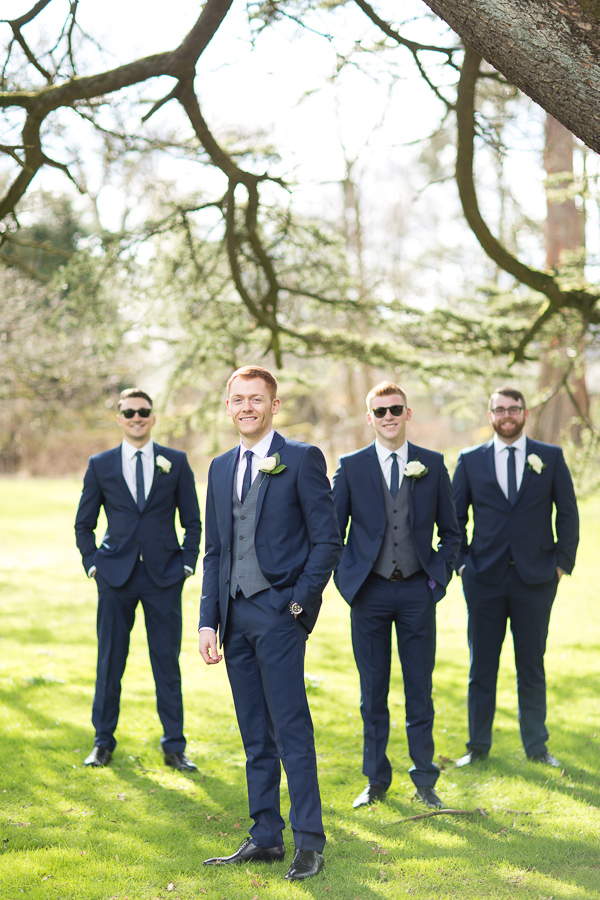 groom in focus of wedding photographer scotland