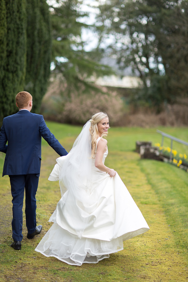 bride turning away looking at photographers scotland 