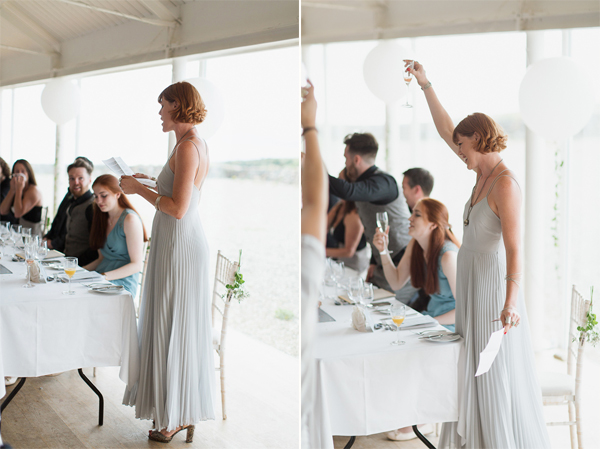 bridesmate raising toast during her wedding speech
