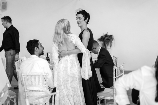 bride speaking with friends