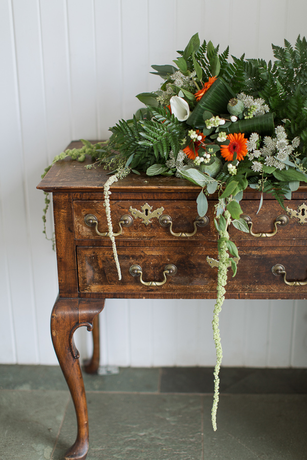 wedding flowers on a vintage chest at crear wedding venue