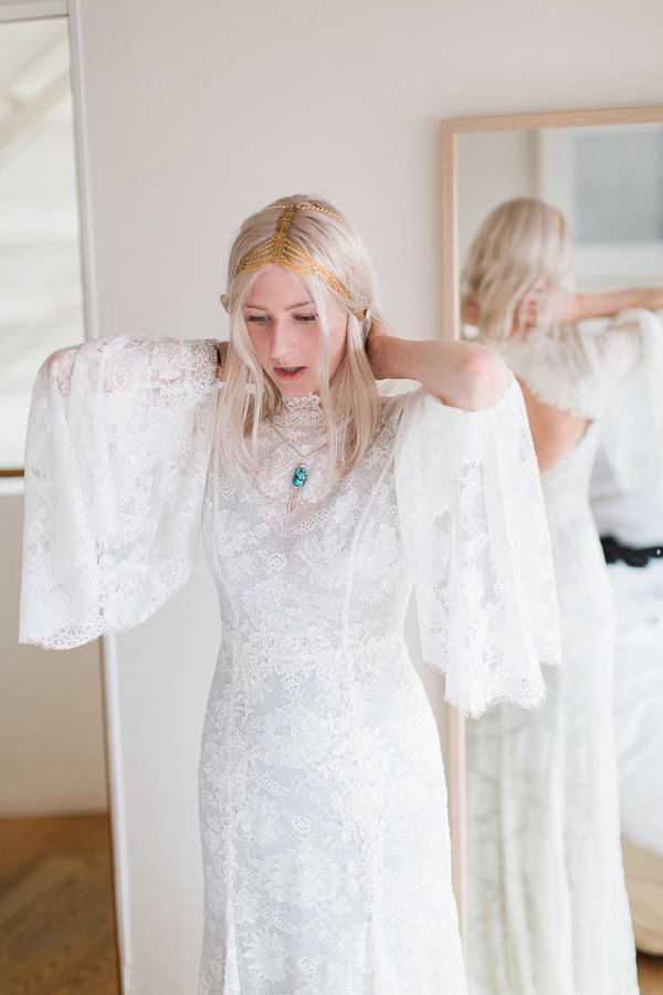 bride in her wedding dress 60s style with neckles