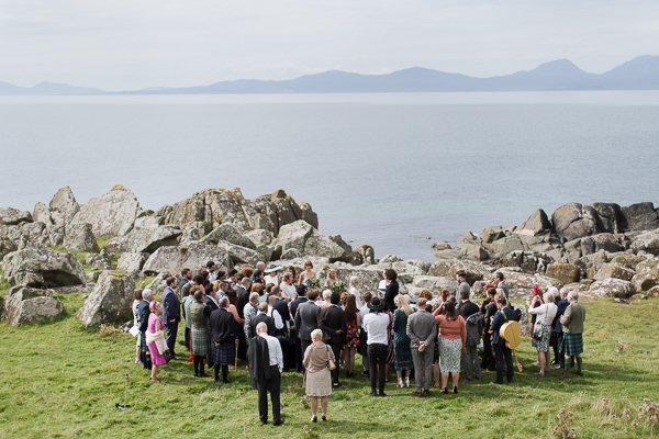 wedding guests arond the married couple crear wedding
