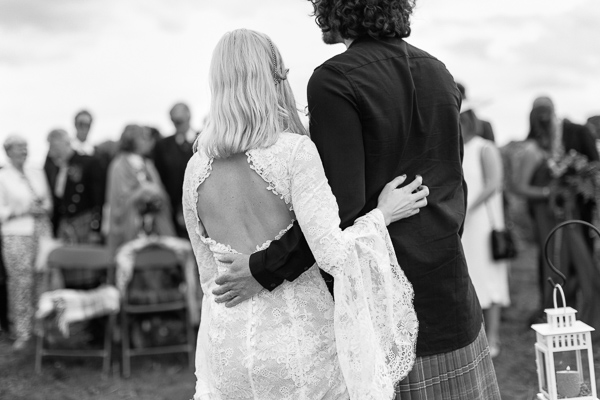 newlyweds embraced during ceremony