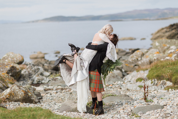 bride and groom kissing embraced at crear