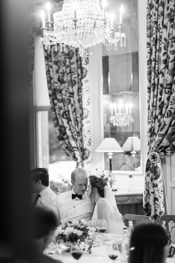 bride and groom talking at wedding dinner table at dundas castle