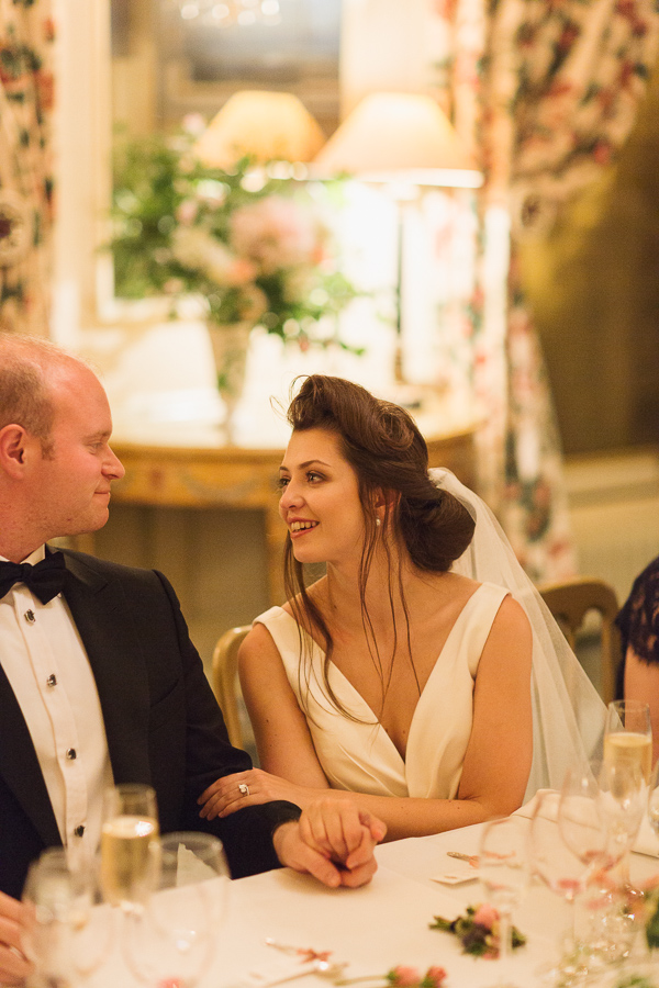 bride looking into groom