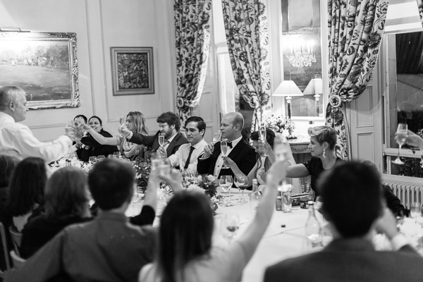 faher of the bride raising toast during his wedding speech