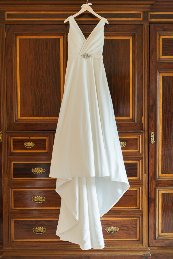 wedding dress hang on vintage wardrobe