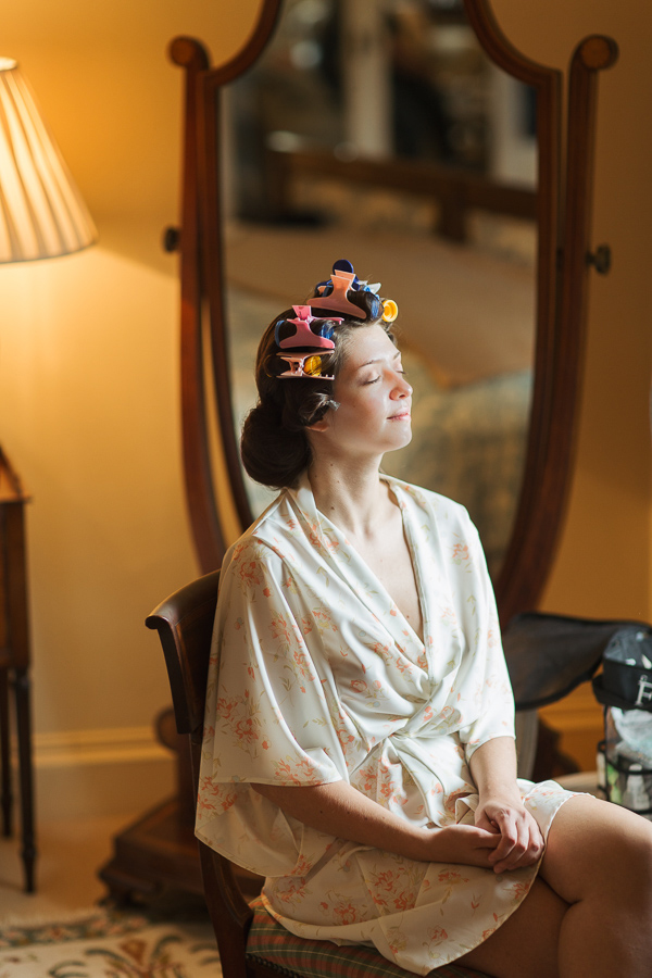 bride having her hair done at dundas castle scottish wedding venue